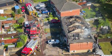 Huge blaze that ripped through four houses caused by ‘discarded cigarette’ in garden