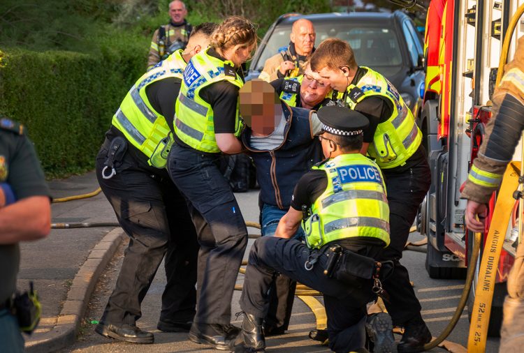 Man ‘helping’ negotiators at Trowbridge armed siege restrained on ground and arrested
