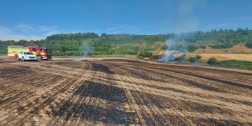 Firefighters battle major field blaze three hectares of crop fields in Wiltshire