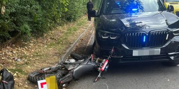 Unmarked police car involved in collision with motorbike in Swindon