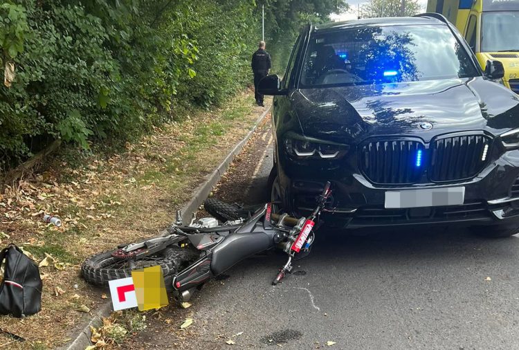 Unmarked police car involved in collision with motorbike in Swindon