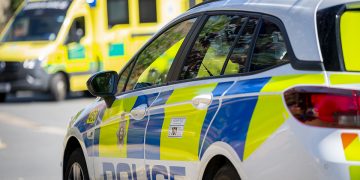 Road in Swindon closed both directions after crash involving car and motorcycle