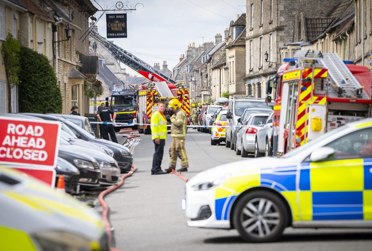 PICTURES: Firefighters tackle Marshfield blaze as two flats and shops destroyed