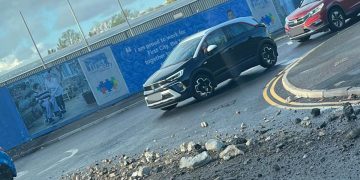 Rubble strewn across Swindon road as police called to deal with obstruction