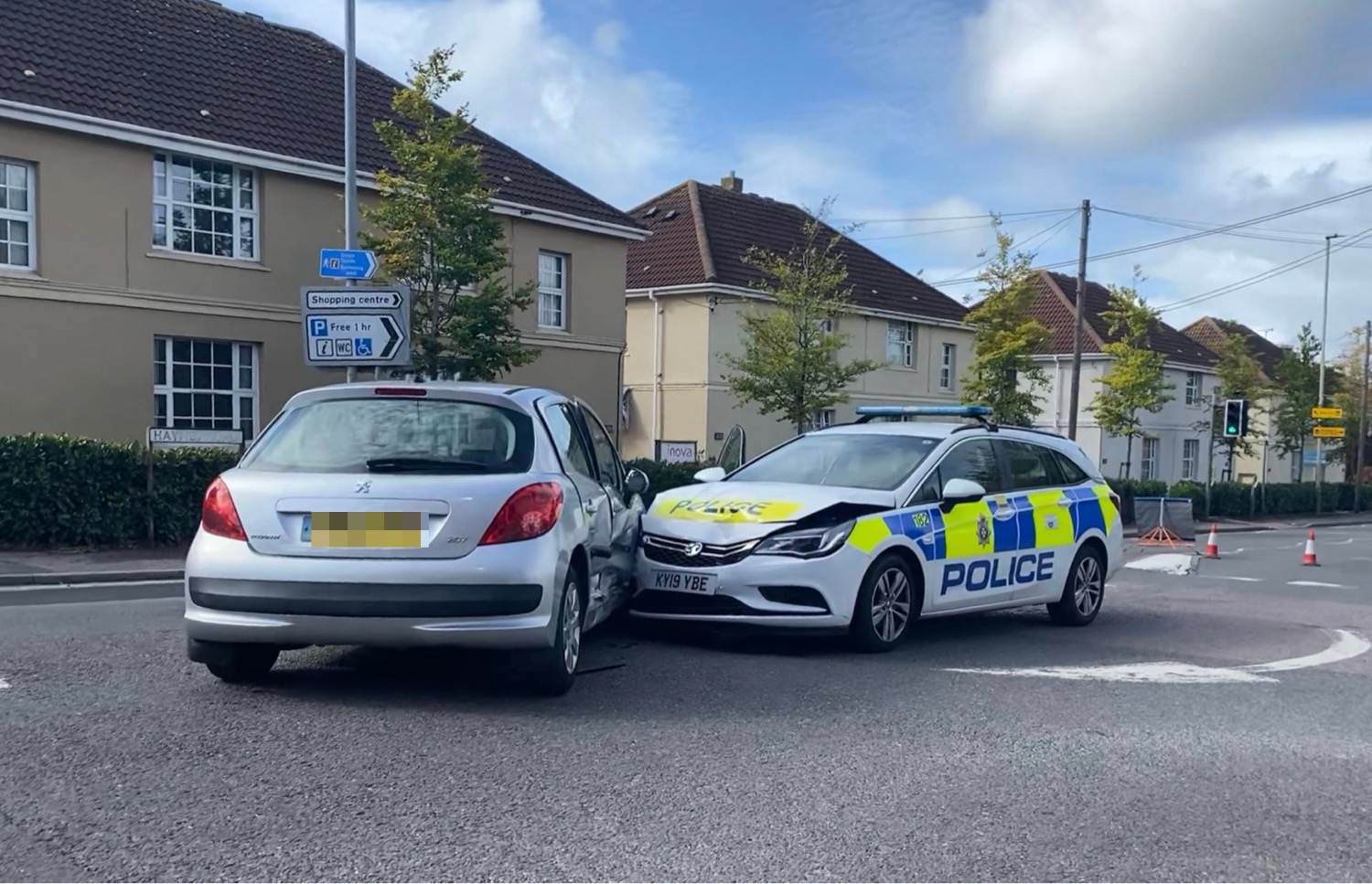 Wiltshire route blocked after police vehicle involved in crash with car