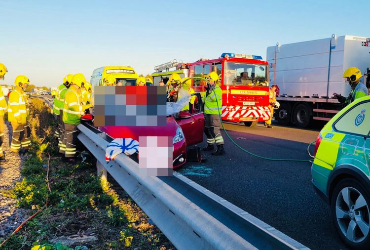 Firefighters cut casualty free from car as traffic builds on M4 in Wiltshire