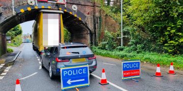 Driver ‘reported for careless driving’ after lorry strikes railway bridge on A36