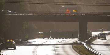 Police probe after woman reportedly falls from M4 bridge before fatal collision