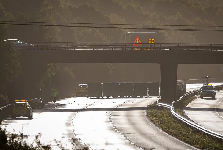 Police probe after woman reportedly falls from M4 bridge before fatal collision
