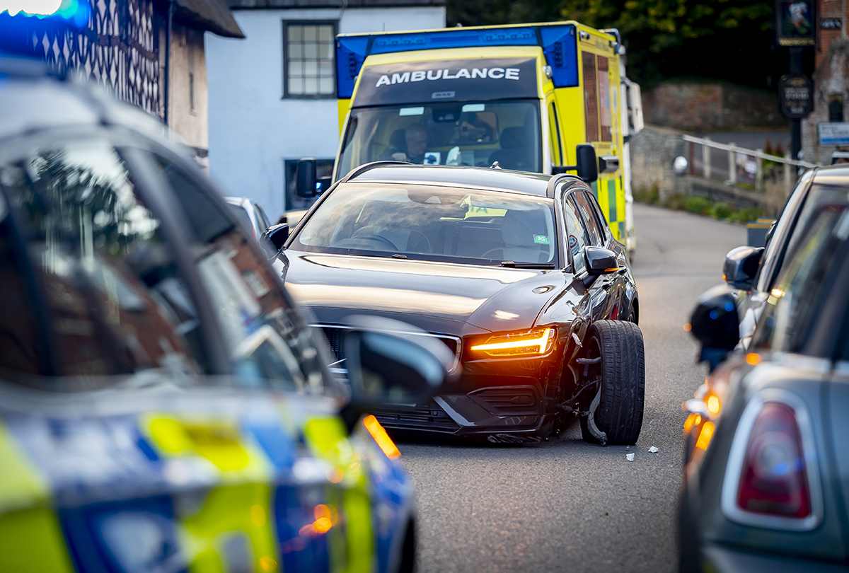 Driver taken to hospital after car crashes into parked vehicle in Potterne