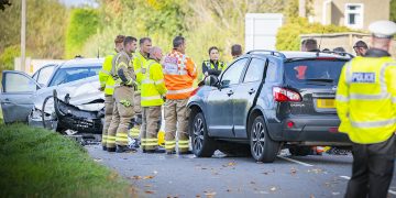 PICTURES: Woman hospitalised after head-on crash on road near Swindon