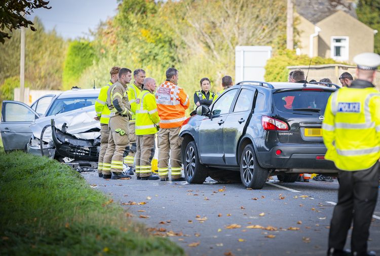 PICTURES: Woman hospitalised after head-on crash on road near Swindon