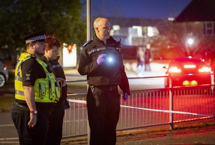 PICTURES: Forensics arrive at knife attack scene in Swindon as darkness descends