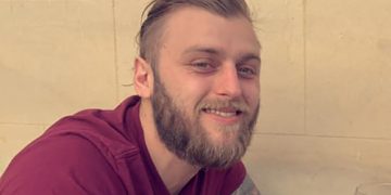Coward hit girlfriend when she confronted him about punching hole in door