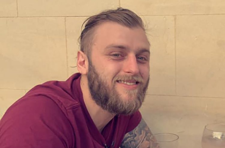 Coward hit girlfriend when she confronted him about punching hole in door