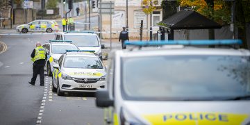 Crime scene after man found seriously injured near multi-storey car park