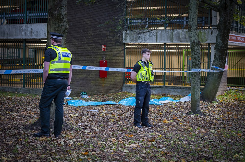 Crime scene after man found seriously injured near multi-storey car park