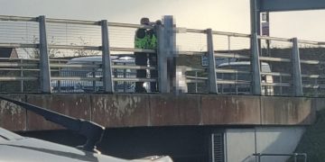 Police officers rush to A419 bridge and cling onto ‘distressed’ man’s clothing