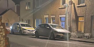 Police officers smash through door of house in central Swindon