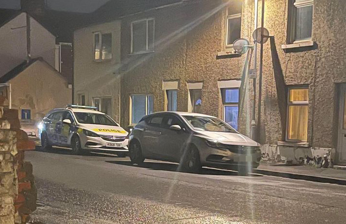 Police officers smash through door of house in central Swindon