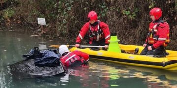 Emergency services mount rescue operation after car plunges into icy canal