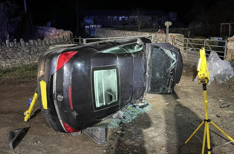 Firefighters rescue two people from overturned car in West Wiltshire