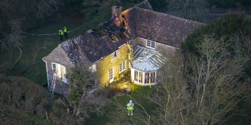 Large emergency services presence at severe house fire in Wiltshire