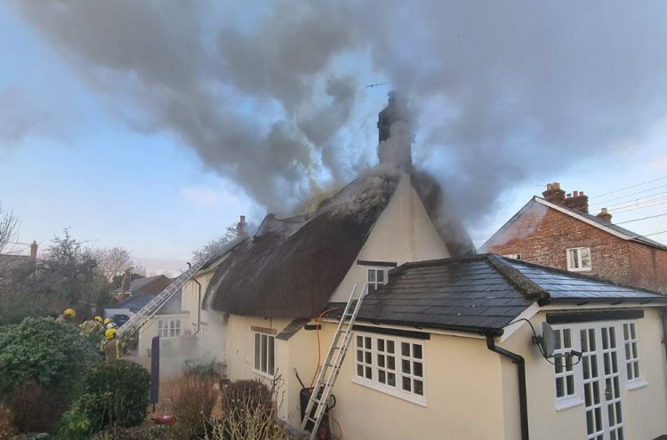 Dozens of firefighters are tackling thatched cottage blaze near Salisbury