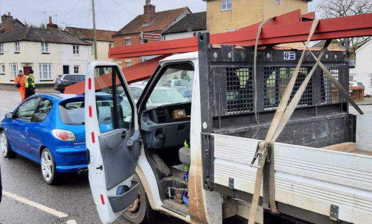 Driver reported to court after insecure steel beam injures motorist