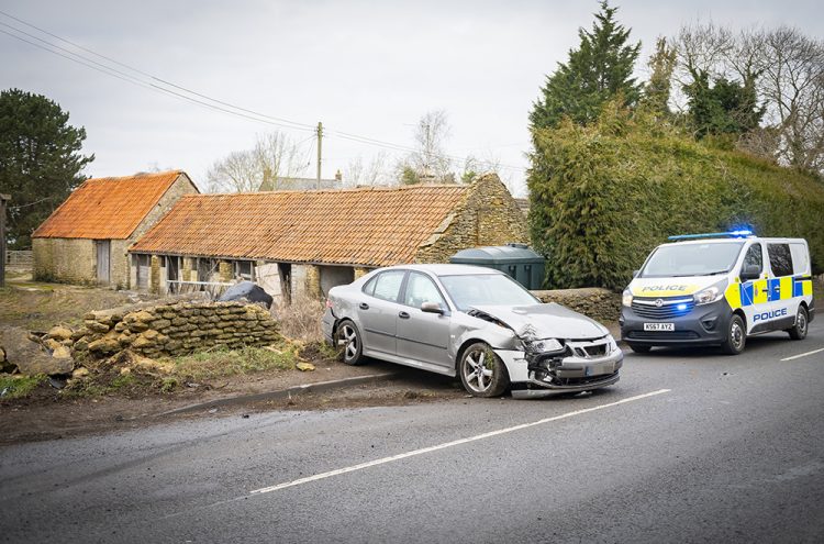 A429 partially blocked after car ploughs into farm wall near Malmesbury
