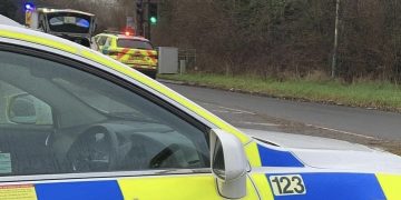 Swindon road closed as emergency services deal with crash near crossing