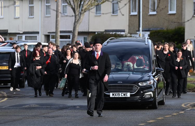 Hundreds of mourners line Swindon streets to say final goodbye to Owen Dunn