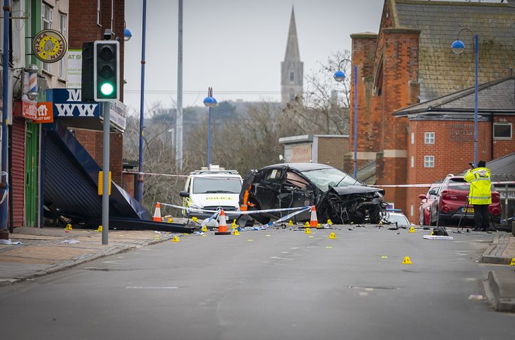 Swindon route closed for collision investigation after car ploughs into shopfront