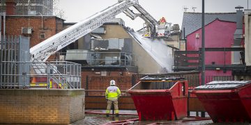 Firefighters continue to battle Swindon town centre blaze ten hours on