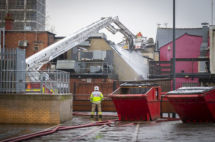 Firefighters continue to battle Swindon town centre blaze ten hours on