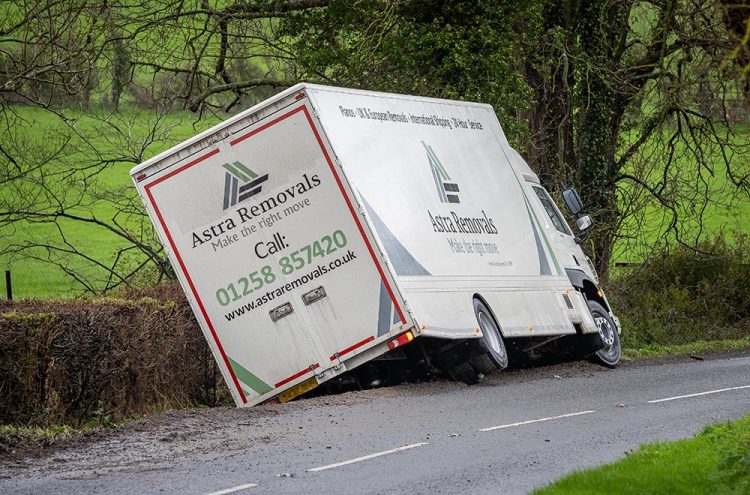 Wiltshire road partially blocked as lorry crashes into ditch – AGAIN