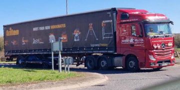 Car left sandwiched between lorry and roundabout in Westbury crash