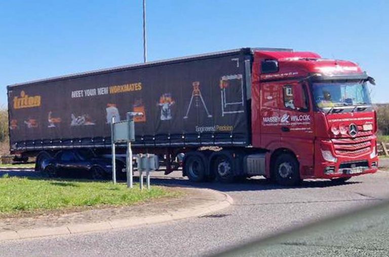Car left sandwiched between lorry and roundabout in Westbury crash