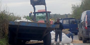 A345 near Durrington partially blocked after tractor loses its load