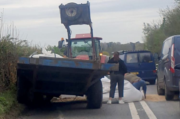A345 near Durrington partially blocked after tractor loses its load