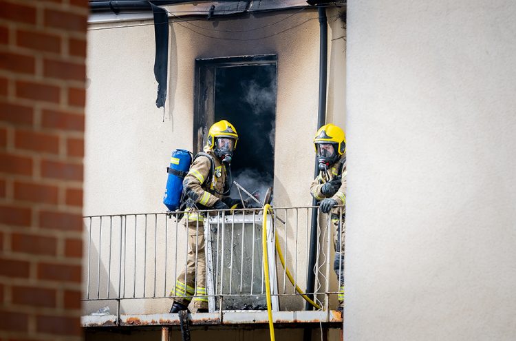 Firefighters tackle blaze at Swindon B&B as police close central route