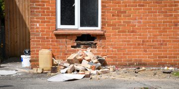 Car crashes into Salisbury house as police report woman to court