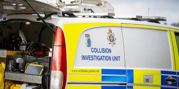 Driver charged after car overturns in A3102 Sandridge Hill crash