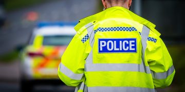 Driver charged after car overturns in A3102 Sandridge Hill crash