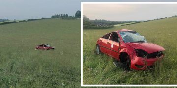 Woman driver injured after car leaves A-road and rolls across field