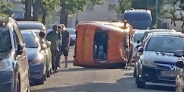 Car overturns in dramatic crash on residential road in Swindon
