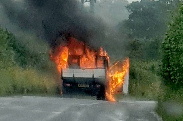 Van blaze blocks countryside road near Royal Wootton Bassett