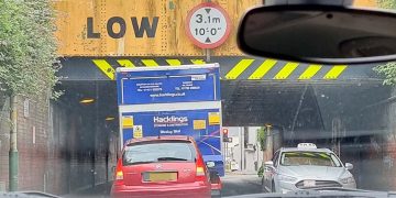 Traffic delays as lorry gets wedged under low bridge in Swindon