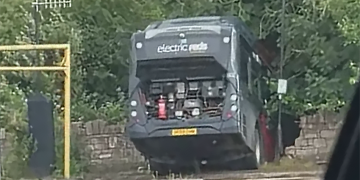 Bus crashes through wall in Salisbury – and gets stuck in ditch