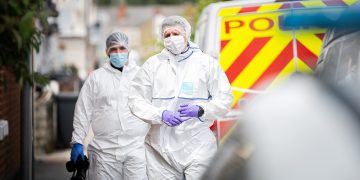 Man and woman quizzed by detectives over knife murder of Neil Bambrick